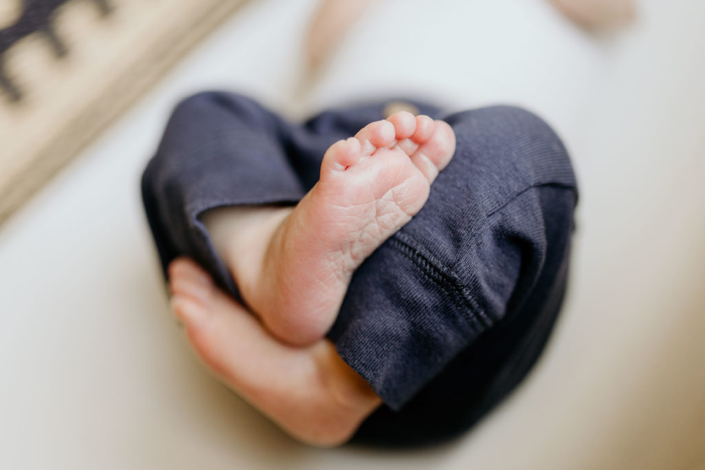 baby foot In Home Newborn Photography