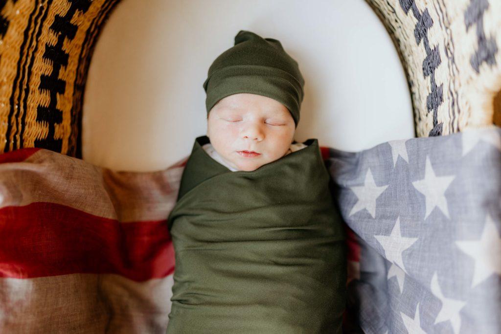 Baby on American Flag In Home Newborn Photography
