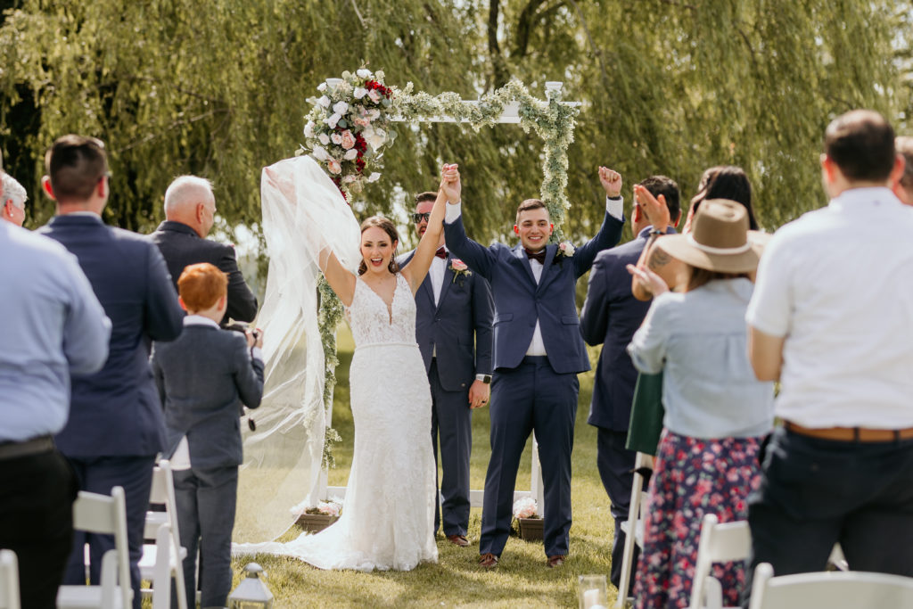 ceremony exit cheers, Missouri wedding photographer