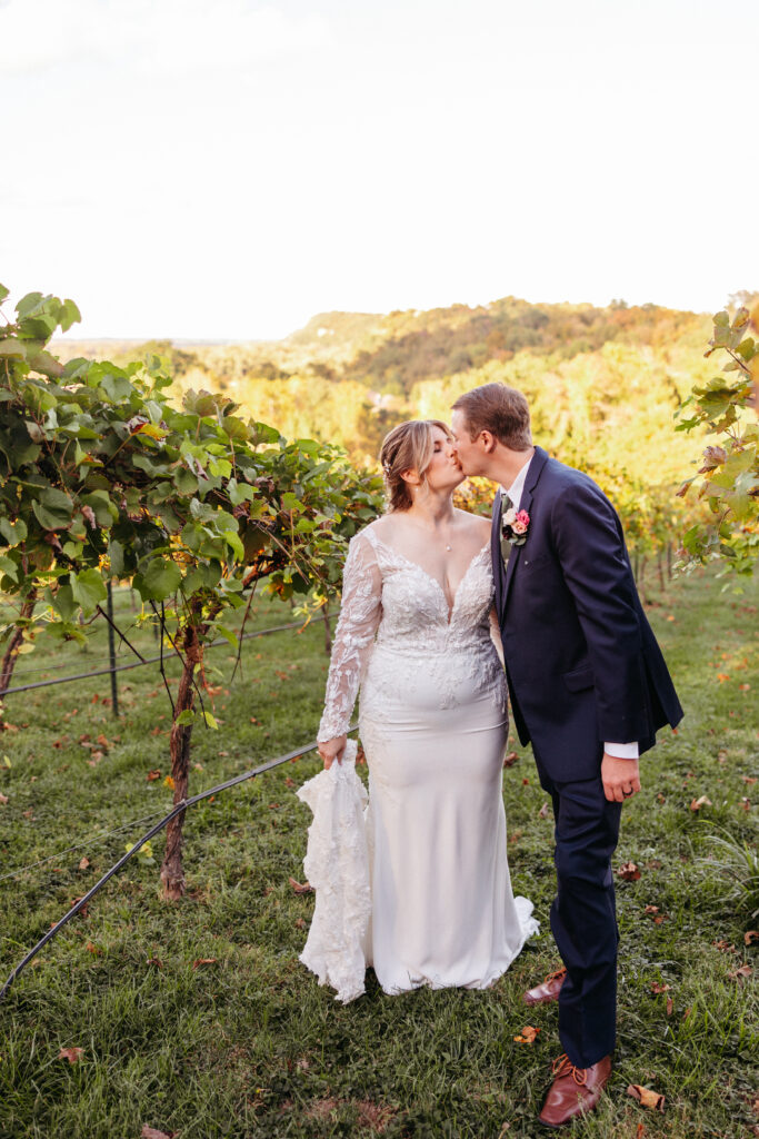 bride and groom embrace at The Inns at St. Albans