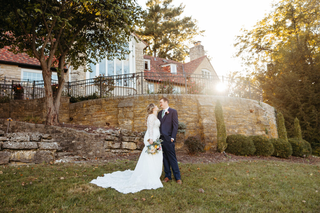 bride and groom embrace at The Inns at St. Albans
