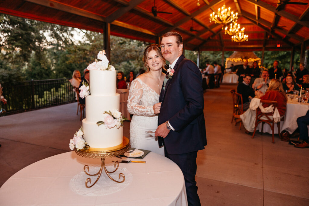 cake cutting at a wedding reception at The Inns at St. Albans