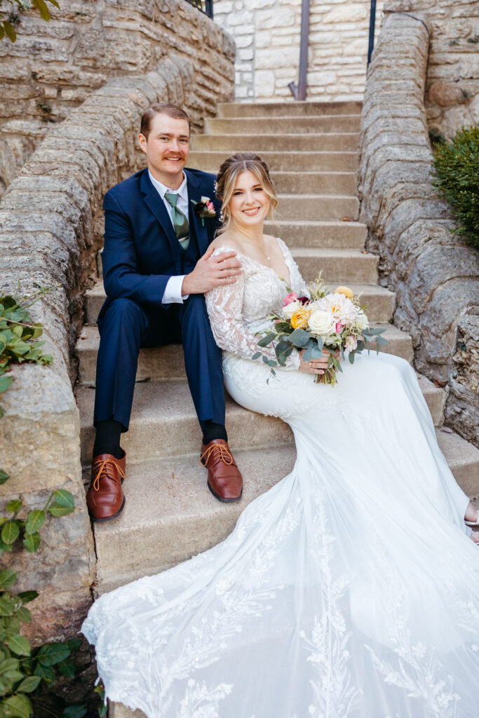 bride and groom embrace at The Inns at St. Albans