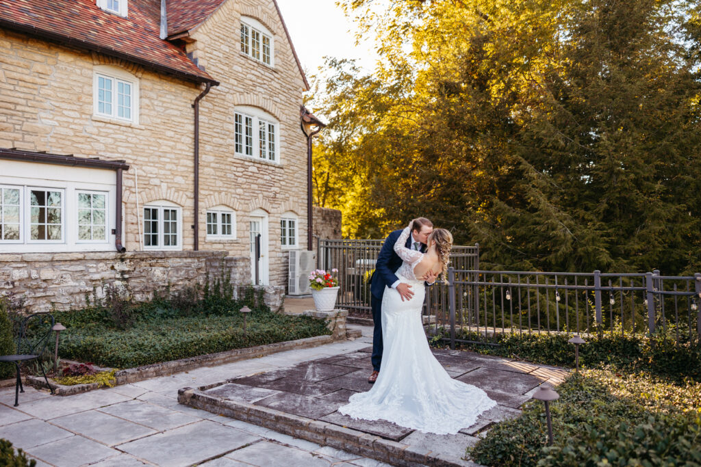 bride and groom embrace at The Inns at St. Albans