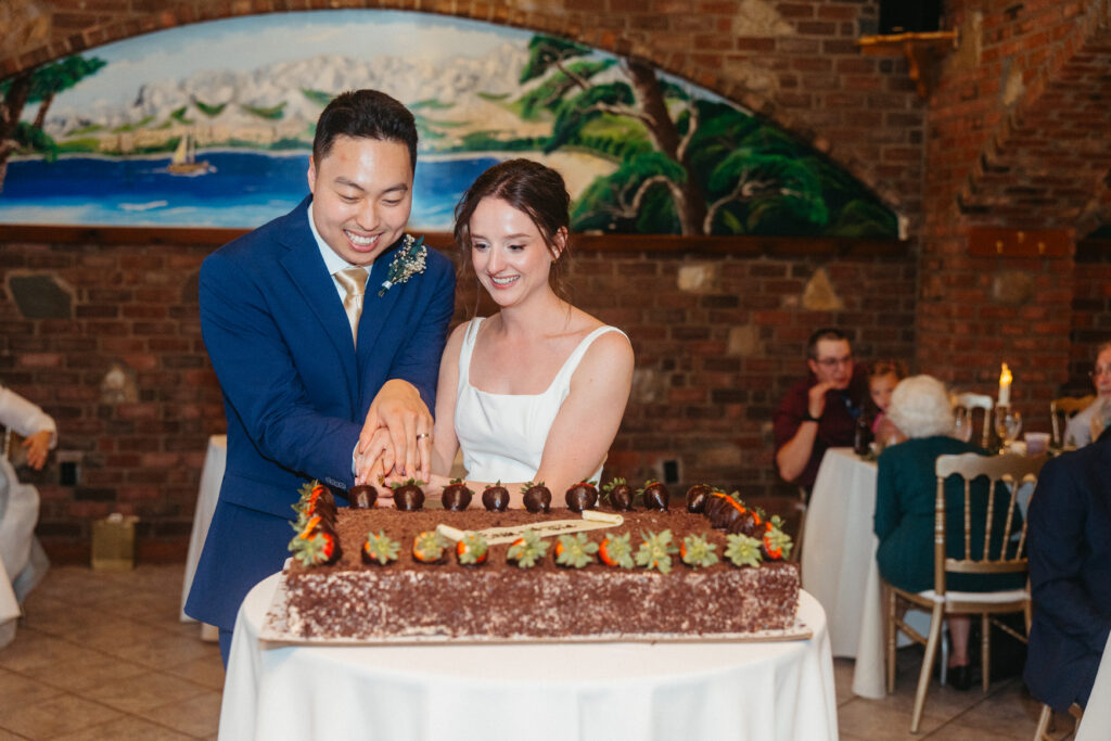 cake cutting wedding reception Grbic Events St. Louis