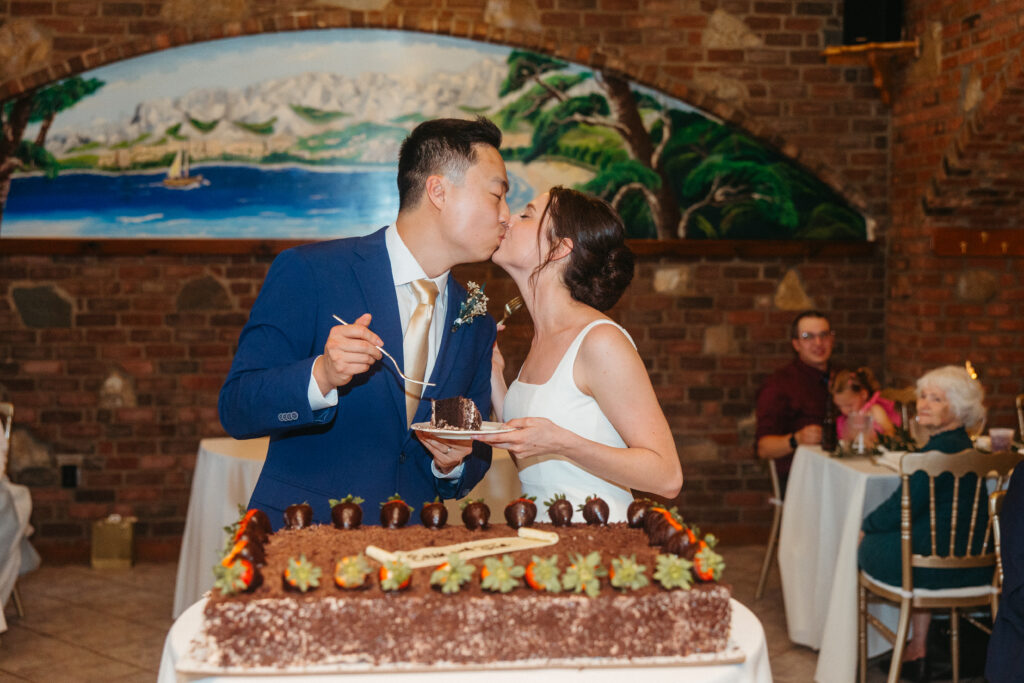 cake cutting wedding reception Grbic Events St. Louis