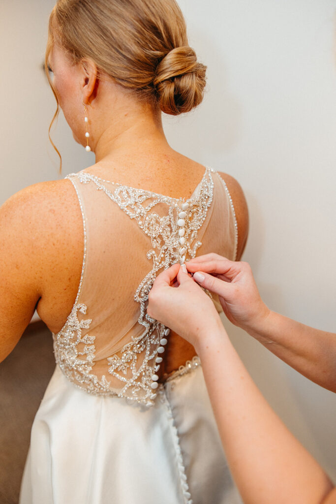 buttoning brides dress, Schlafly Tap Room Wedding