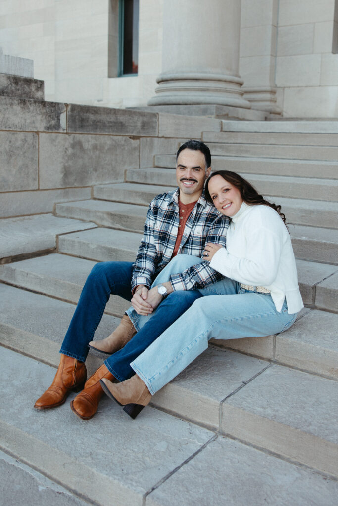 St. Louis wedding photographer with engaged couple in fall Forest Park