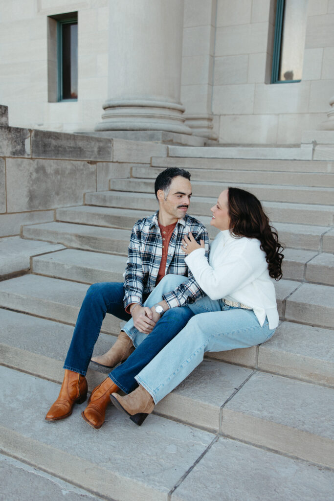 St. Louis wedding photographer with engaged couple in fall Forest Park