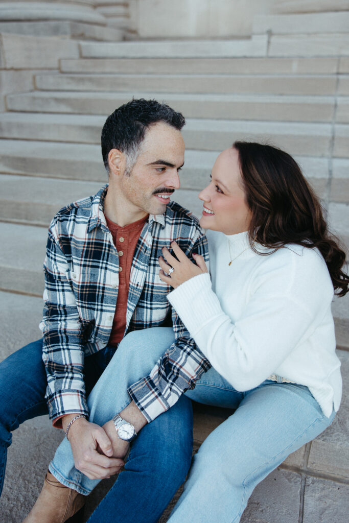 St. Louis wedding photographer with engaged couple in fall Forest Park