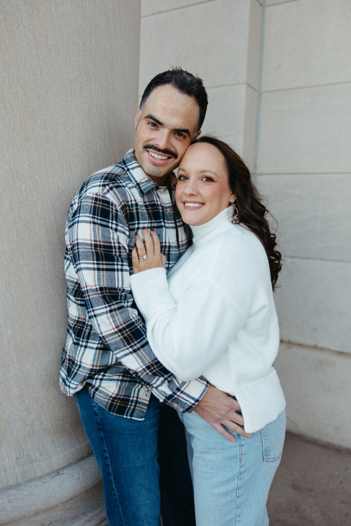 St. Louis wedding photographer with engaged couple in fall Forest Park
