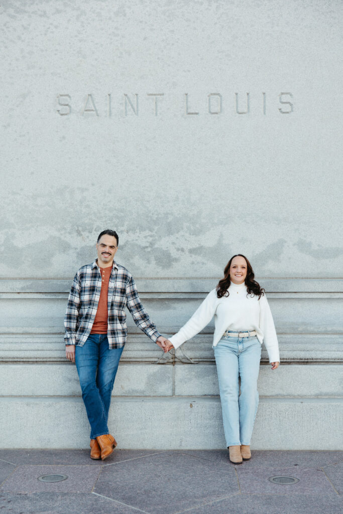 St. Louis wedding photographer with engaged couple in fall Forest Park