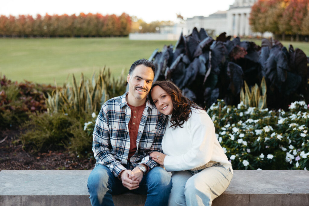 St. Louis wedding photographer with engaged couple in fall Forest Park