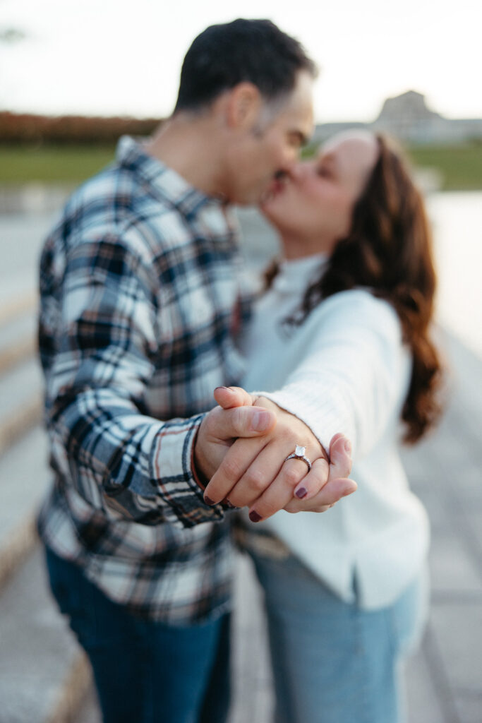 St. Louis wedding photographer with engaged couple in fall Forest Park