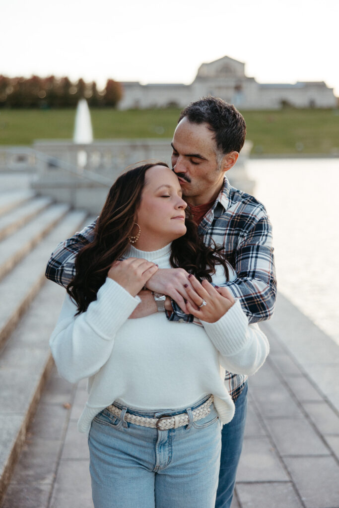 St. Louis wedding photographer with engaged couple in fall Forest Park