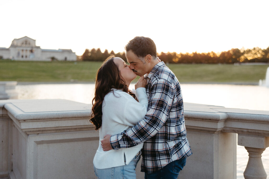 St. Louis wedding photographer with engaged couple in fall Forest Park